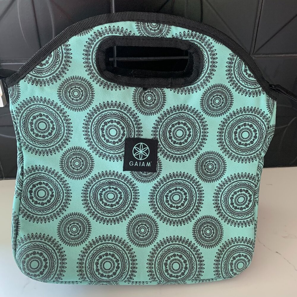 Never used lunch tote. Gaiam teal and black, insulated, 11in by 11in.